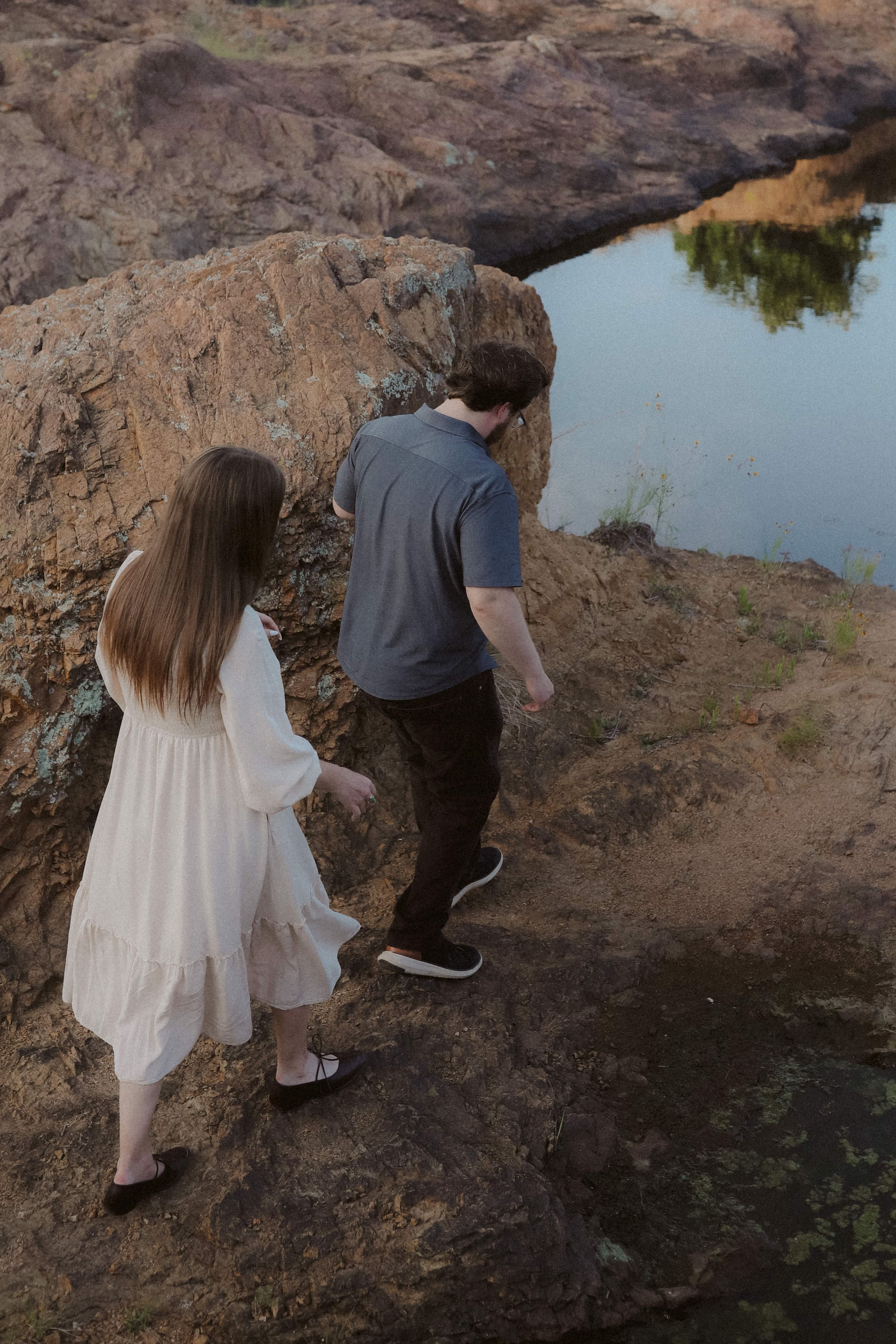 Picking their way across the granite toward the reflecting pool
